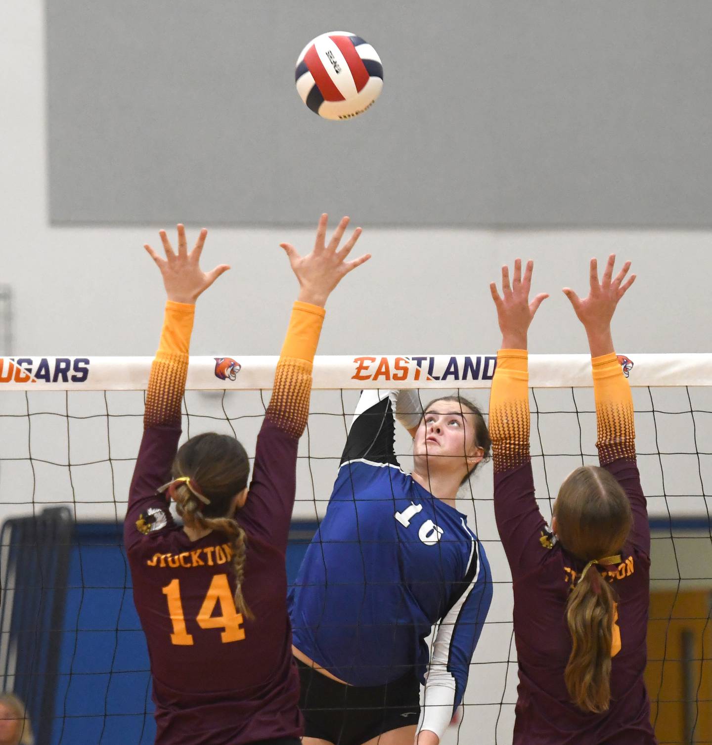 Newark's Rylie Carlson (16) hits the ball as two Stockton players go up to block at the 1A Eastland sectional on Tuesday, Nov. 4, 2025 in Lanark. The Lady Norsemen fell in two sets 25-21, 25-18.