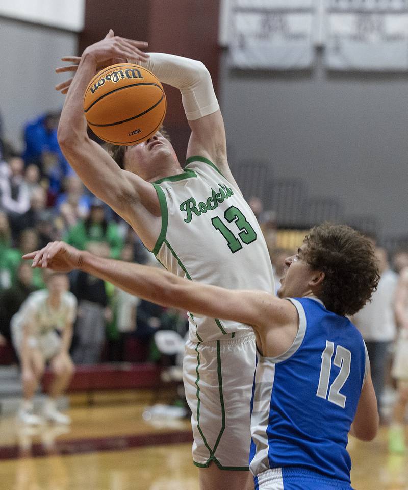 Rock Falls’ Ryken Howard is fouled by Princeton’s Asa Gartin Friday, March 7, 2025, in the Class 2A boys basketball Sectional final in Marengo.