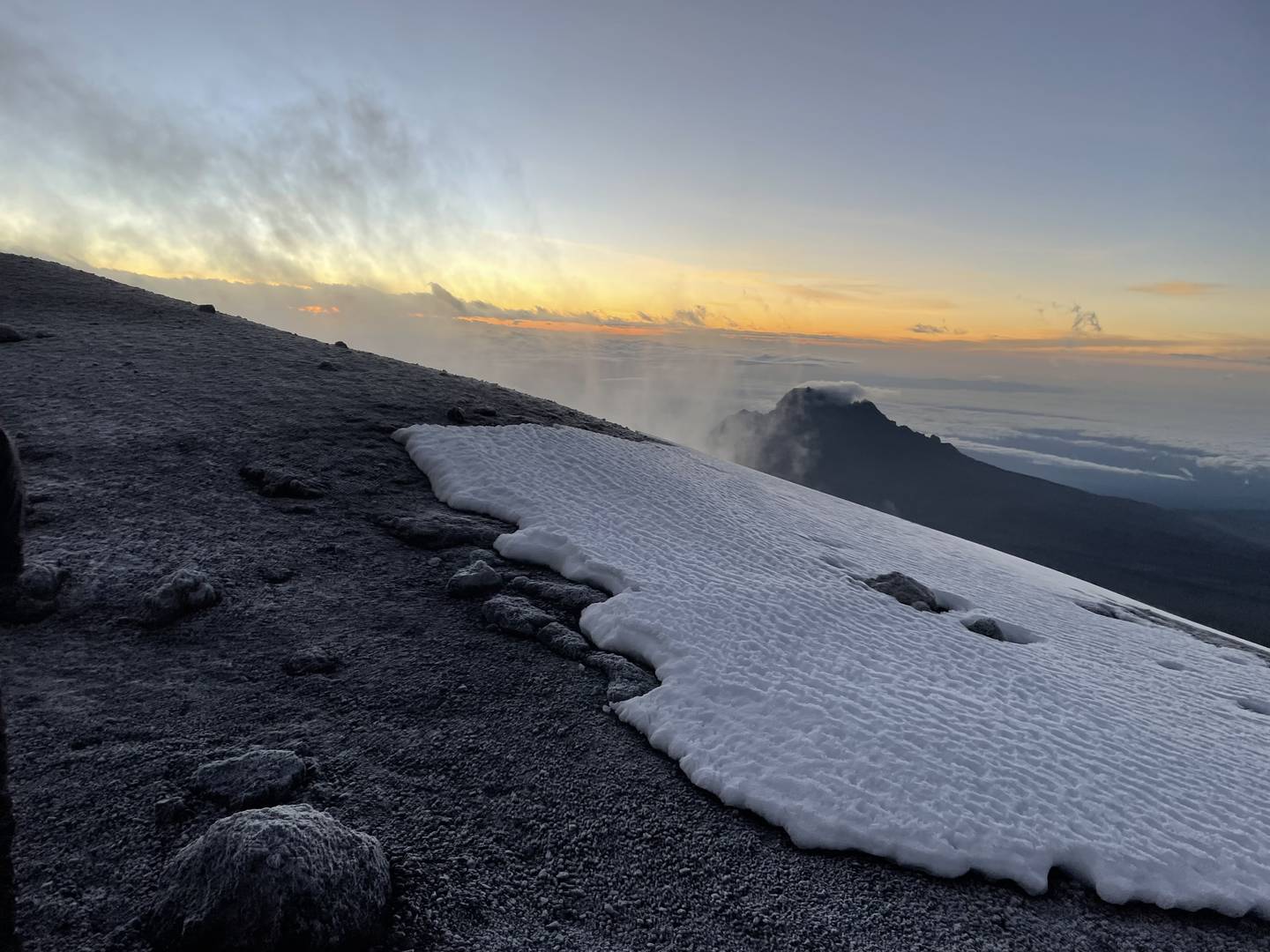 This view above the clouds on Mount Kilimanjaro in Tanzania was pictured in May 2022. A group of 13 volunteers hiked the 19,300-foot mountain with DeKalb-based nonprofit Tanzania Development Support to raise awareness and nearly $40,000 in funds for educational improvements for girls and boys in Mara, Tanzania.
