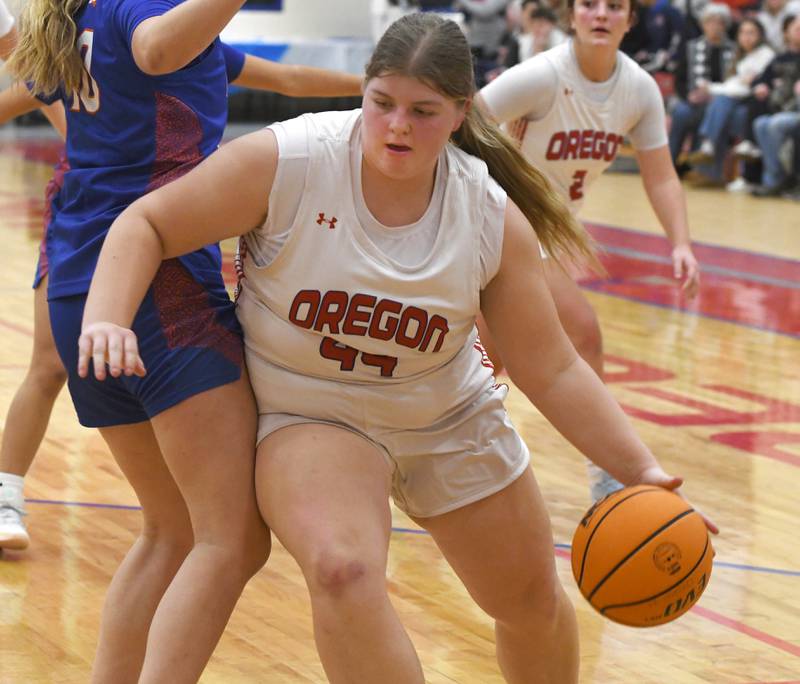 Oregon's Noelle Girton makes a move to the basket against Genoa-Kingston on Friday, Jan. 30, 2026 at the Blackhawk Center.