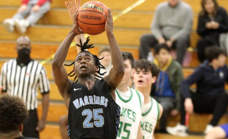 Willowbrook’s Noah Campbell (25) shoots the ball during a Class 4A Glenbard West Regional semifinal against York in Glen Ellyn on Wednesday, Feb. 23, 2022.