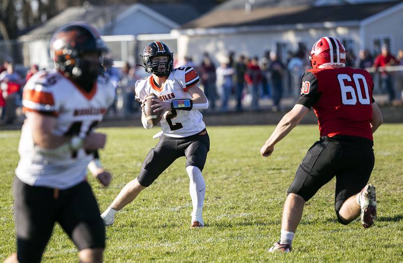 Milledgeville’s Kyson Francis looks to throw against Amboy Saturday, Nov. 15, 2025, in the 8-man football semifinal.