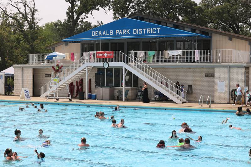 High temperatures make for a crowded pool Tuesday, July 25, 2023, at Hopkins Pool in DeKalb.