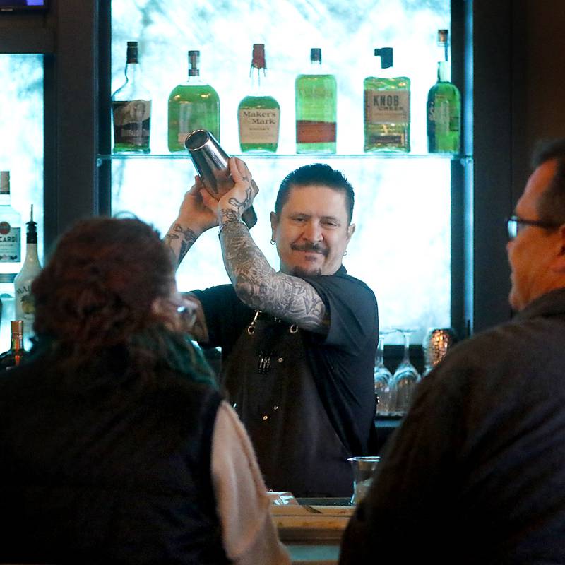 Joe LeBlanc makes an “Order in the Court” drink on Thursday, April 4, 2024, at The Courthouse tavern in McHenry. The building was the original McHenry County Courthouse when McHenry was still the county seat.