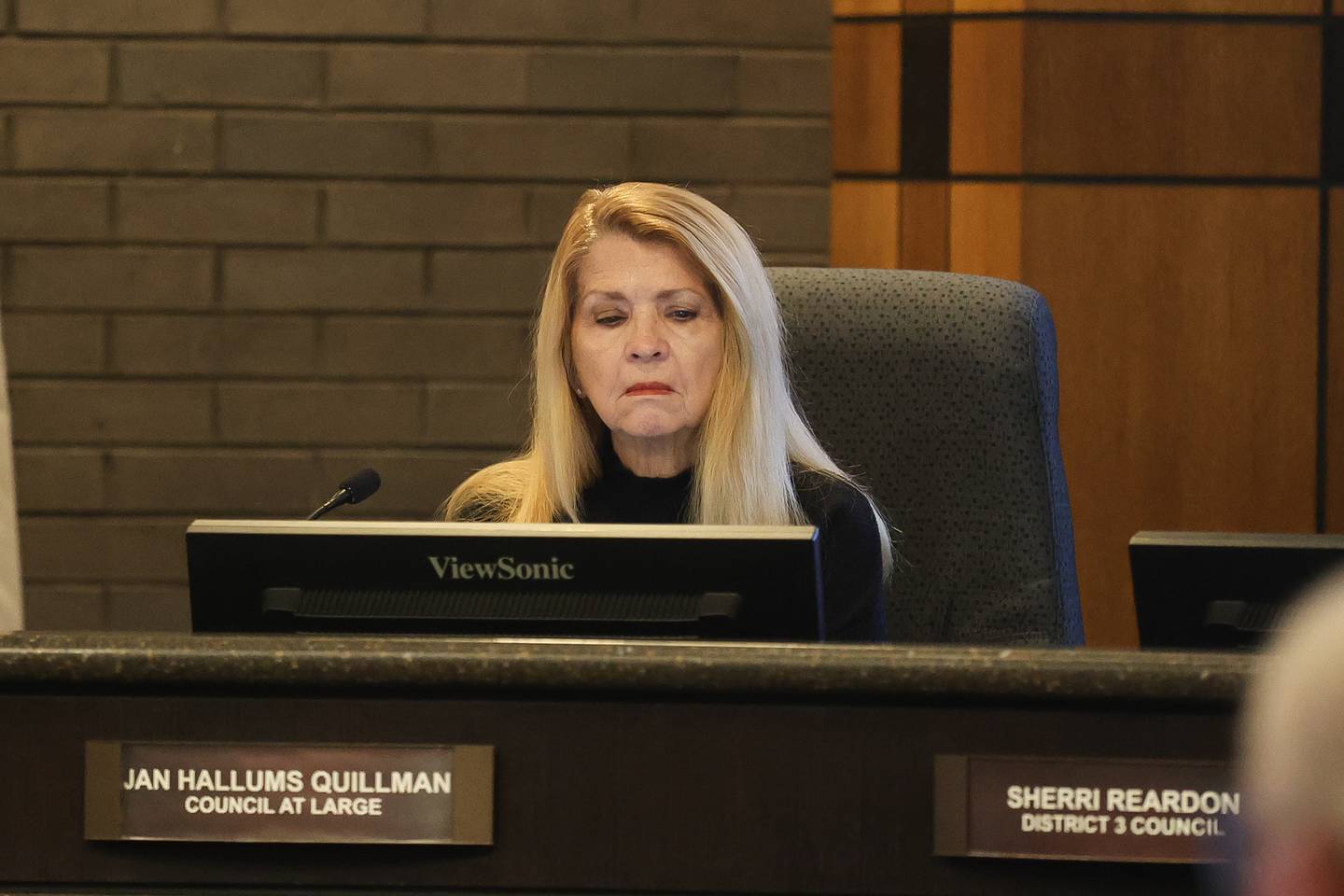 Councilwoman Jan Quillman looks at some notes during the Joliet city council meeting to vote on the Joliet Catholic Academy stadium plan on Tuesday, Jan 20, 2026 in Joliet.