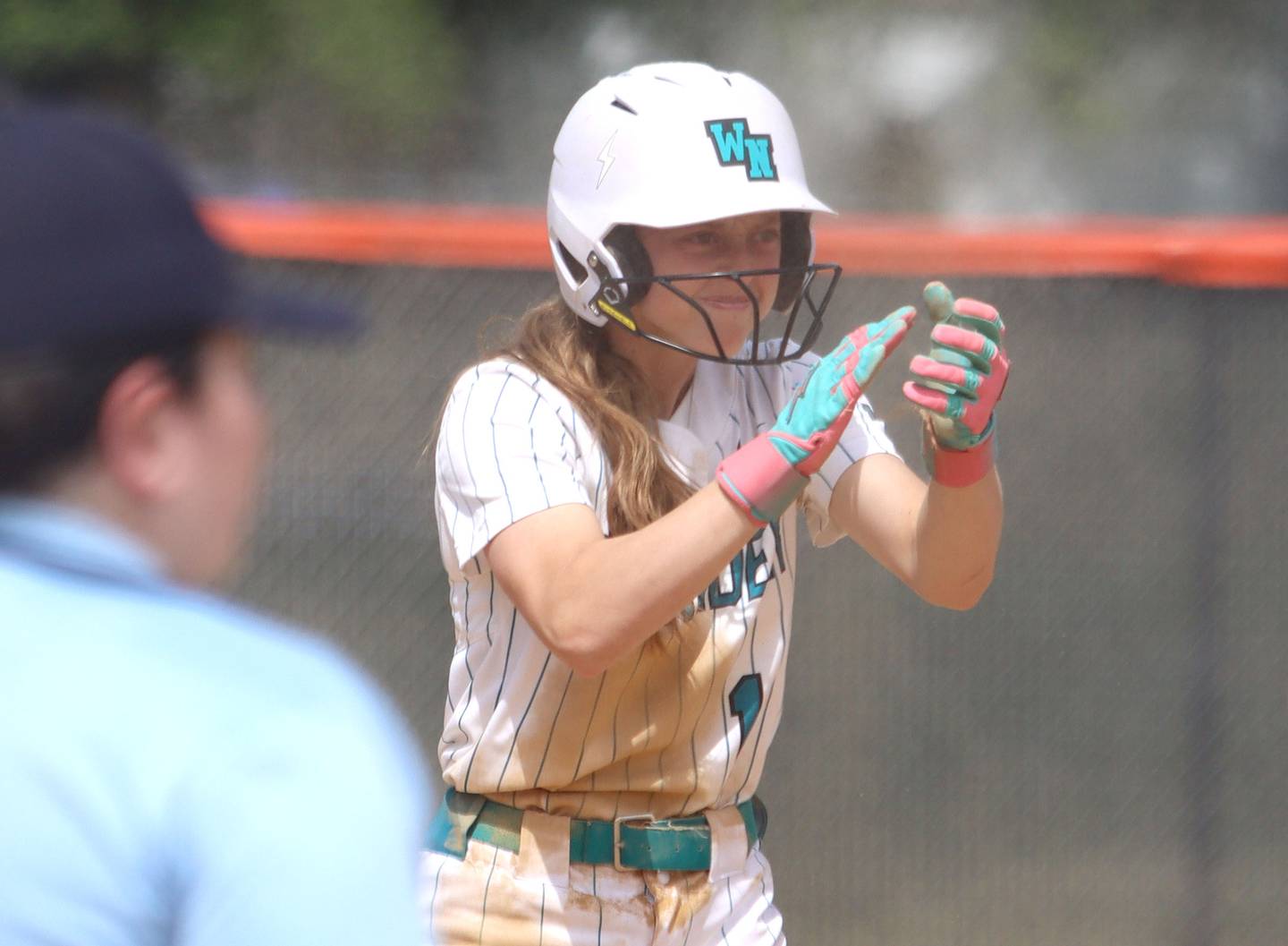 Woodstock North’s Allyson Schaid celebrates a triple against Crystal Lake Central in IHSA Class 3A Regional Title Game softball action on Saturday, May 23, 2026 at Crystal Lake Central High School in Crystal Lake.
