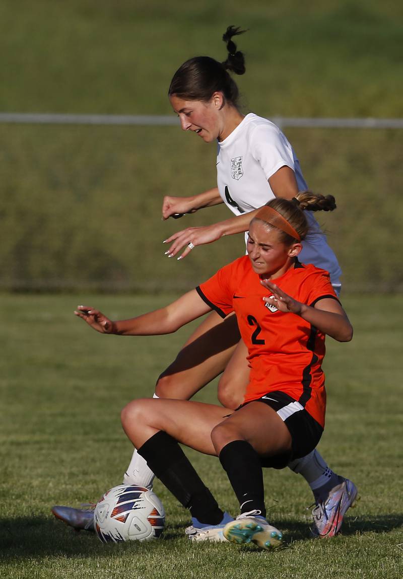 Boylan's Maggie Schmidt knocks down Crystal Lake Central's Kalissa Kaiser as she tries to play the ball during the IHSA Class 2A Burlington Central Girls Soccer Sectional final match Friday, May 26, 2023, at Burlington Central High School.