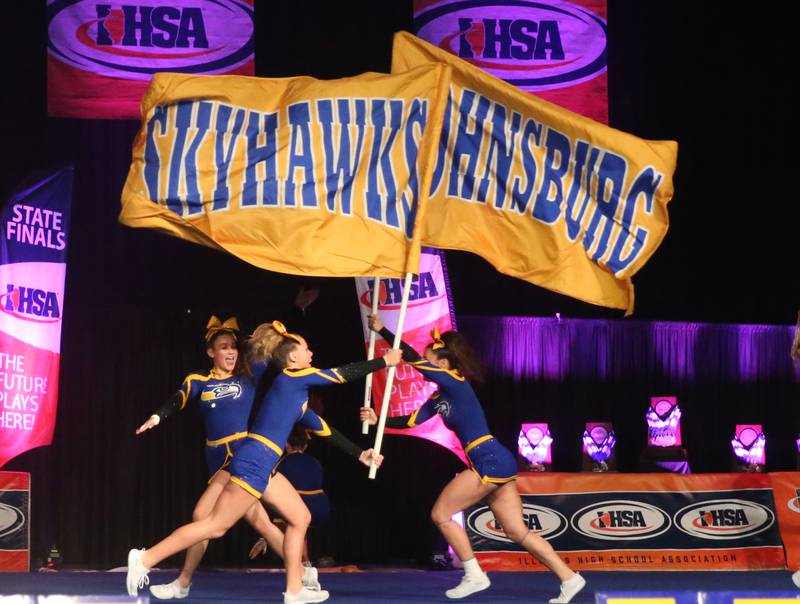 Members of the Johnsburg cheerleading team perform at the Competitive Cheerleading State Final Competition on Saturday, Feb. 3, 2024 at Grossinger Motors Arena in Bloomington.
