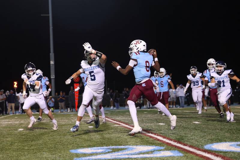 Nazareth's Christopher Kasky reaches to block a pass by Kankakee's Kymani Billings during Kankakee's 33-12 loss to Nazareth on Friday, Aug. 29, 2025.