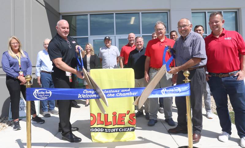 Ollies Warehouse Bargain celebrated it's grand opening with a ribbon cutting on Wednesday, Aug. 21, 2024 in Princeton. Gathered at the ceremony were Brian McNabb Ollie's senior vice president and Princeton Mayor Ray Mabry. The new distribution center is 615,000 square foot, which is about the equivalent of 11 football fields. It will serve 150 stores in the Midwest. The cost of the project is 68 million.