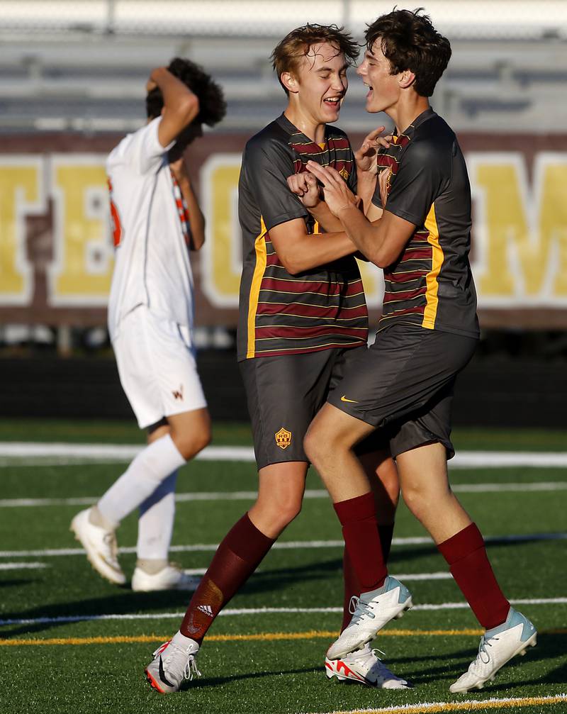 Richmond-Burton's Dalton Youngs celebrates his goal with teammate, Ethan Sell, during the IHSA Class 1A Richmond-Burton Regional Final soccer match against Winnebago Tuesday, Oct. 17, 2023, at Richmond-Burton High School in Richmond.