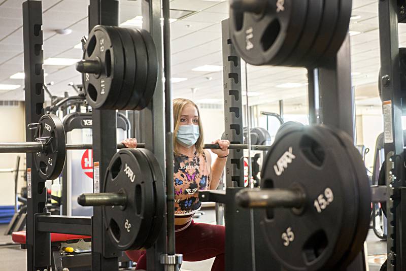 Sophie Terry, a first semester student at SVCC studying nutrition, works out in the school's fitness center. Numbers are down from the 2021 spring semester but hopes are high that normalcy is returning.