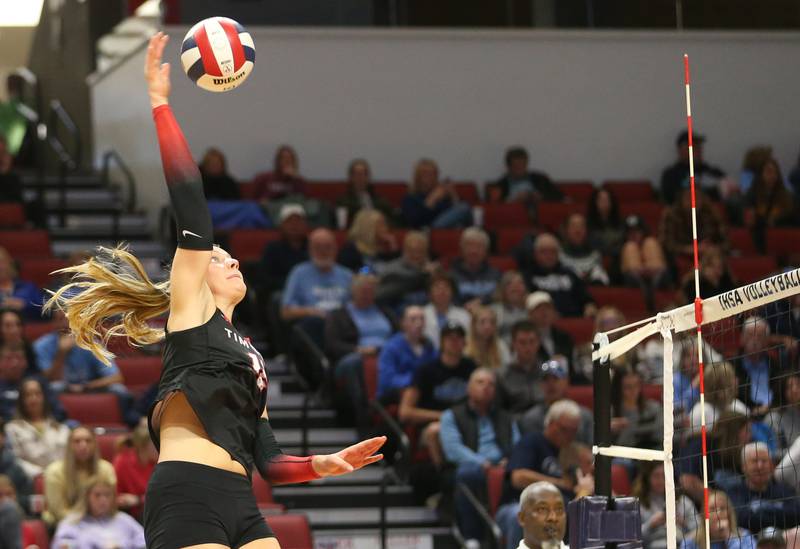 Timothy Christian's Abby VanderWal hits the ball to the Bloomington Central Catholic side of the net during the Class 2A State semifinal game on Friday, Nov. 15, 2024 at CEFCU Arena in Normal.
