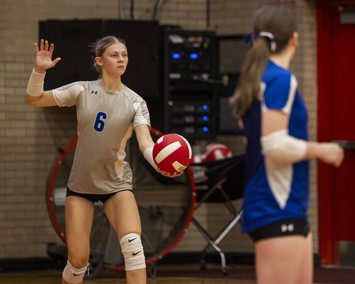 Caroline Keutzer (2) of Princeton serves volleyball on Thursday, Sept. 18, 2025 at Ottawa High School in Ottawa.