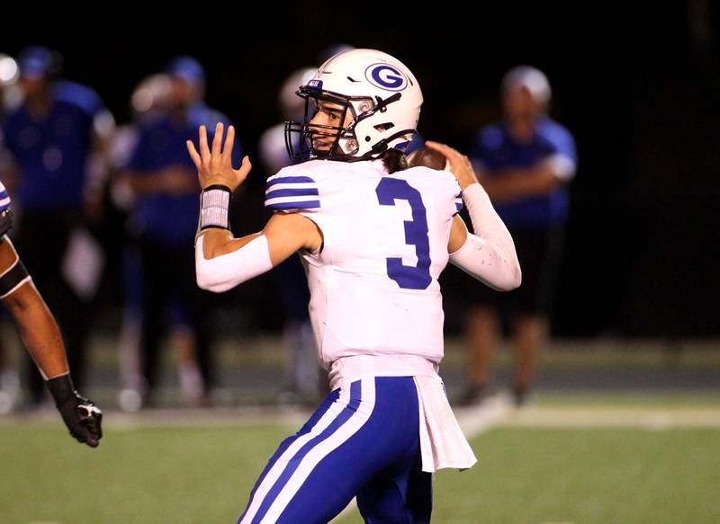 Geneva quarterback Nate Stempowski looks to throw the ball during a game at Wheaton Warrenville South on Friday, Sept. 16, 2022.