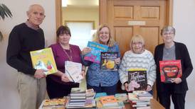 Forrestville Valley Youth Network donates books to grade school library