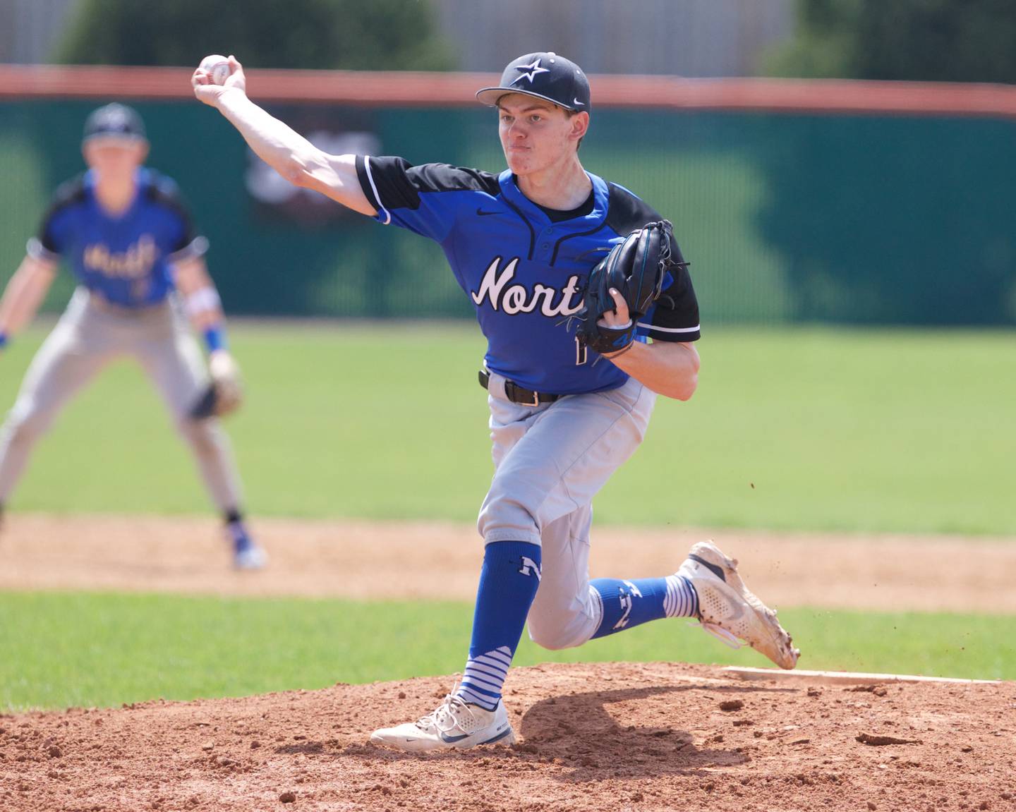 St. Charles North's Josh Caccia delivers a pitch  against St. Charles East on Saturday April 27, 2024 in St. Charles.