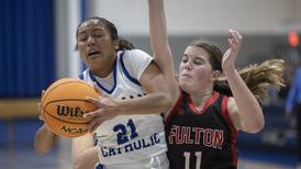 Photos: Newman faces off against Fulton in girls basketball