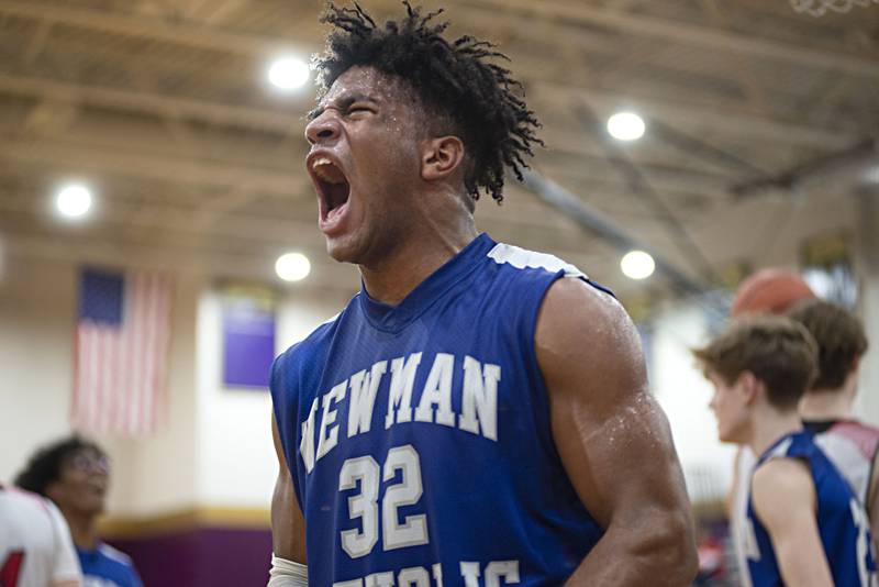 Newman's Marcus Williams celebrates a three-point play against South Beloit Wednesday, March 2, 2022. Newman went on to defeat the SoBos 57-38.