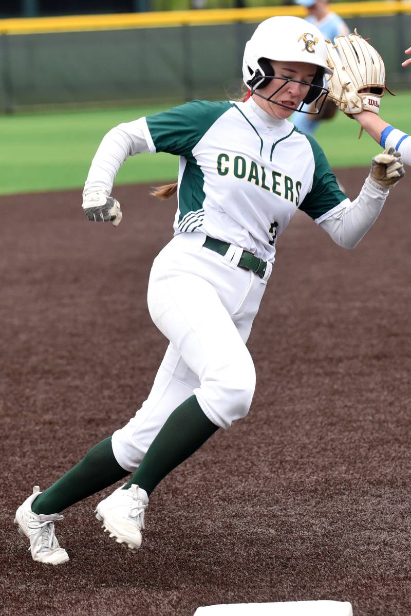 Coal City's Madi Petersen rounds third base and heads home during the Coalers' Class 2A Regional semifinal against Joliet Catholic Wednesday, May 21, 2025.