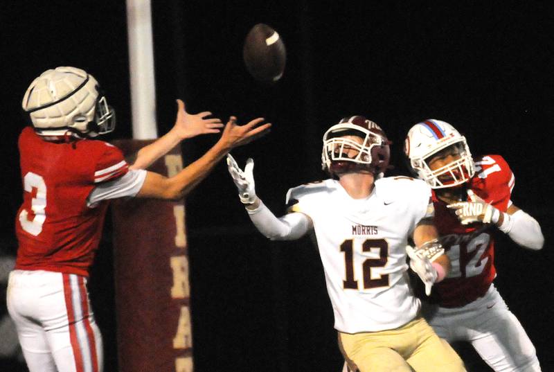Ottawa's George Shumway intercepts a pass for Morris' R.J. Kennedy (12) in the end zone on Friday, Oct. 10, 2025 at King Field in Ottawa.