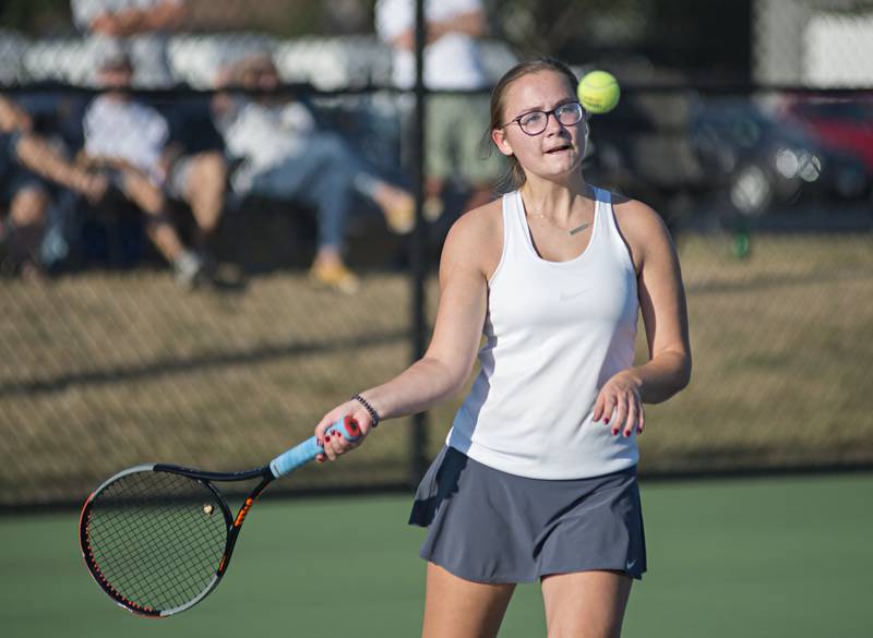 Sterling's Anna Meltzer eyes the ball while returning a shot against Sycamore's Abby Golembiewski and Abby Bourdage in a doubles match on Thursday, Sep. 16, 2021.