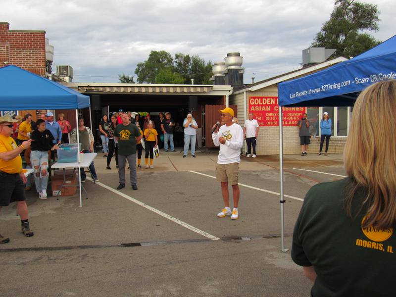 Kent Bugg addresses the crowd before the Megan's Mission 5K.