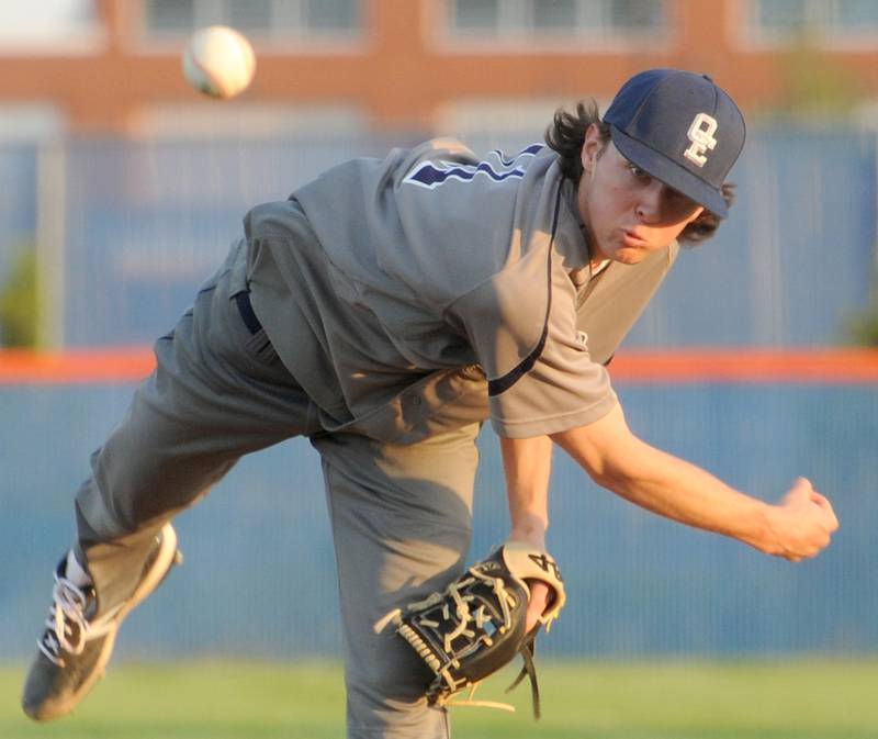 Oswego East pitcher Ashton Izzi throw a pitch to an Oswego batter during a varsity boys baseball game on Thursday, May12, 2022 at Oswego High School.