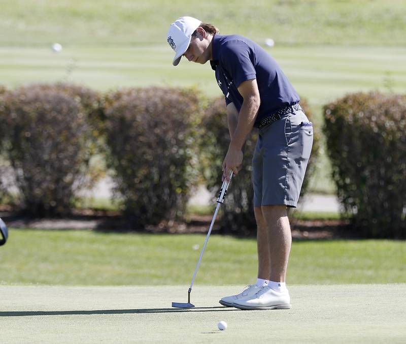 Cary-Grove’s Maddux Tarasievich putts on the first green during the IHSA Boys’ Class 3A Sectional Golf Tournament Monday, Oct. 3 2022, at Randall Oaks Golf Club in West Dundee.
