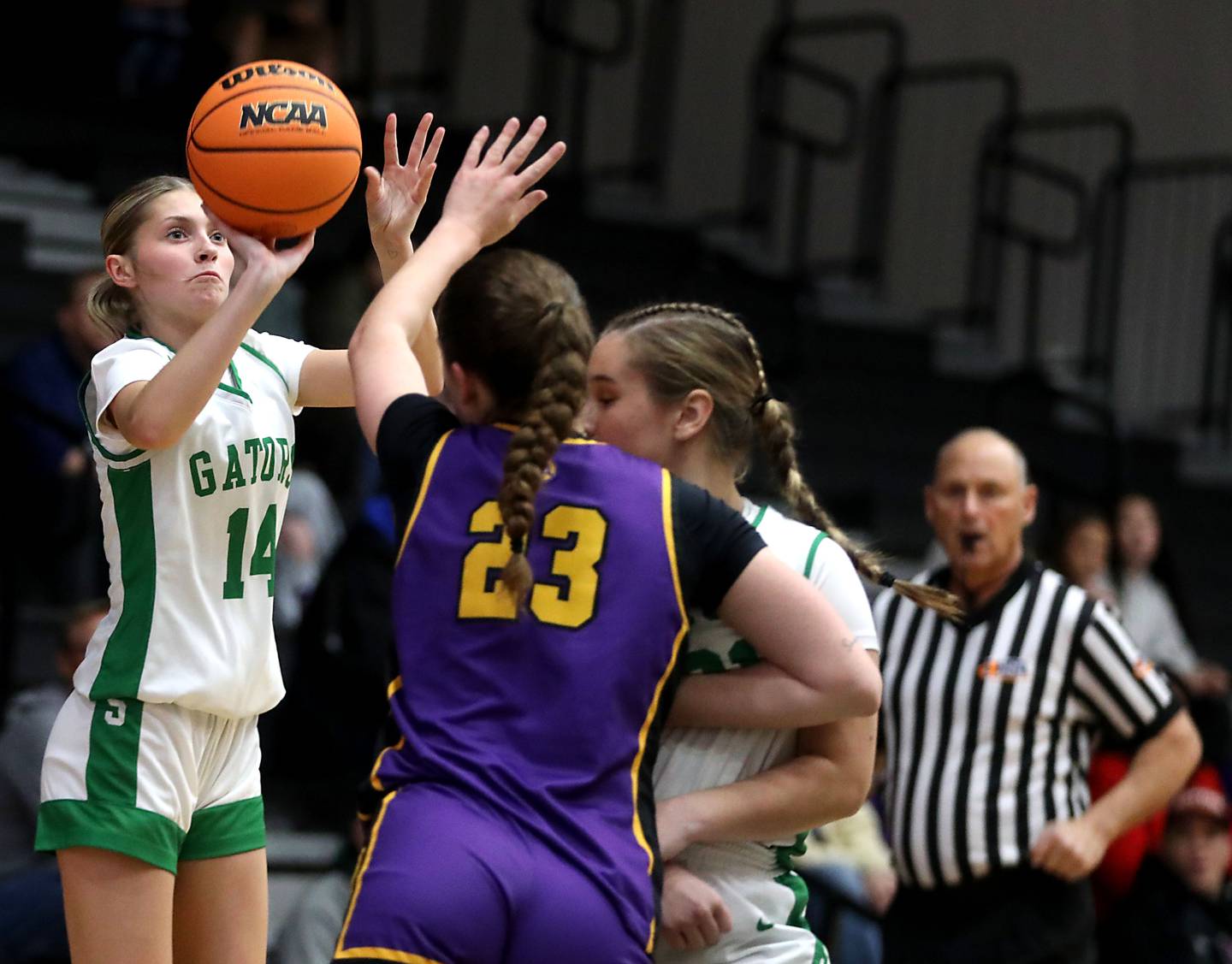 Crystal Lake South's Makena Cleary launched a three-point basket attempt during the Northern Illinois Holiday Classic Championship girl basketball game against Wauconda on Thursday, Dec. 18, 2025, at McHenry High School.