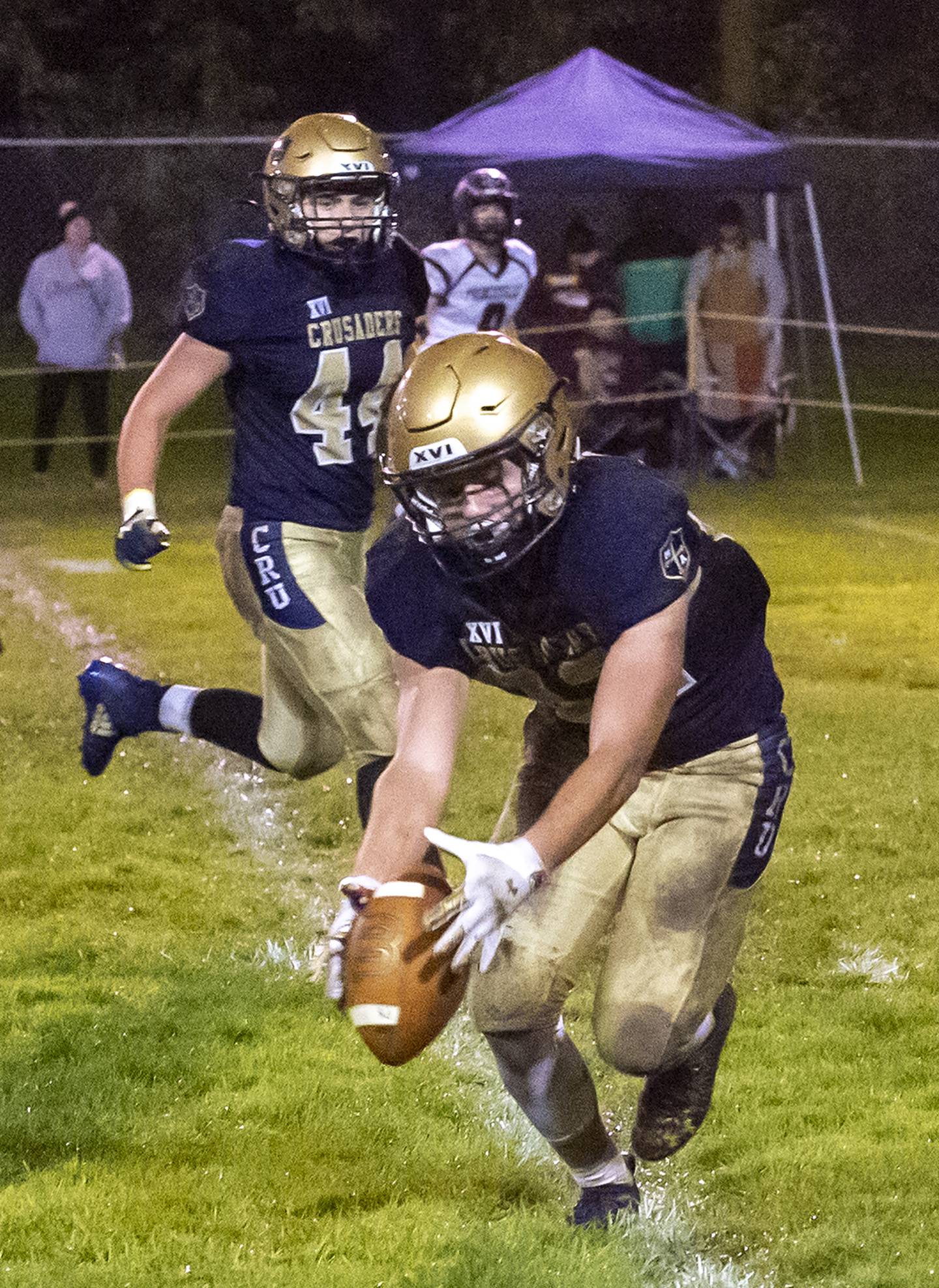 Marquette's Jurnee Reed intercepts a Princeville pass during Friday's 1A playoff game at Gould Stadium in Ottawa.