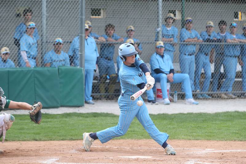 Marquette's Griffin Dobberstein smacks a hit against St. Bede on Monday, April 22, 2024 at St. Bede Academy.