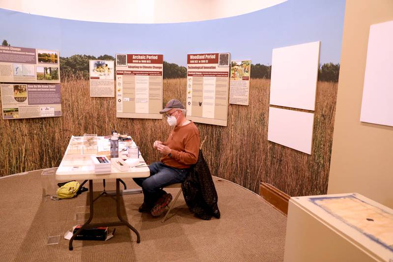 Volunteer Jeff Grant works on mounting spear heads for the  Elmhurst History Museum’s latest exhibit,“People of the Prairie: 12,000 Years in DuPage County.” The exhibit opens on Feb. 4 and runs through June 5 at the Elmhurst History Museum, located at 120 E. Park Ave. in downtown Elmhurst.