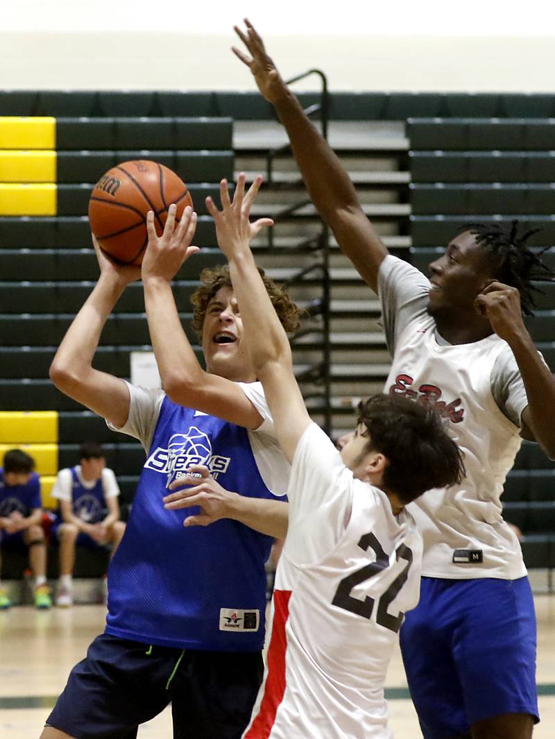 Woodstock's Max Beard shoots the ball during a game against Rockford East Friday, June 23, 2023, in the Crystal Lake South Gary Collins Shootout, at the high school in Crystal Lake.