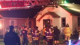 Photos: Firefighters respond to house fire in Spring Valley
