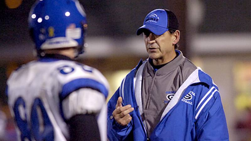 Geneva coach Rob Wicinski (right) and the Vikings face a daunting second-round 7A playoff matchup tonight against host Wheaton Warrenville South.