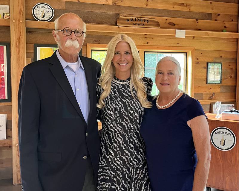 Larry Berke (from left), Kendra Thornton and Kay Berke are pictured during the 50th anniversary party for Royal Travel and Tours on Oct. 6, 2022, at Whiskey Acres Distillery in DeKalb.
