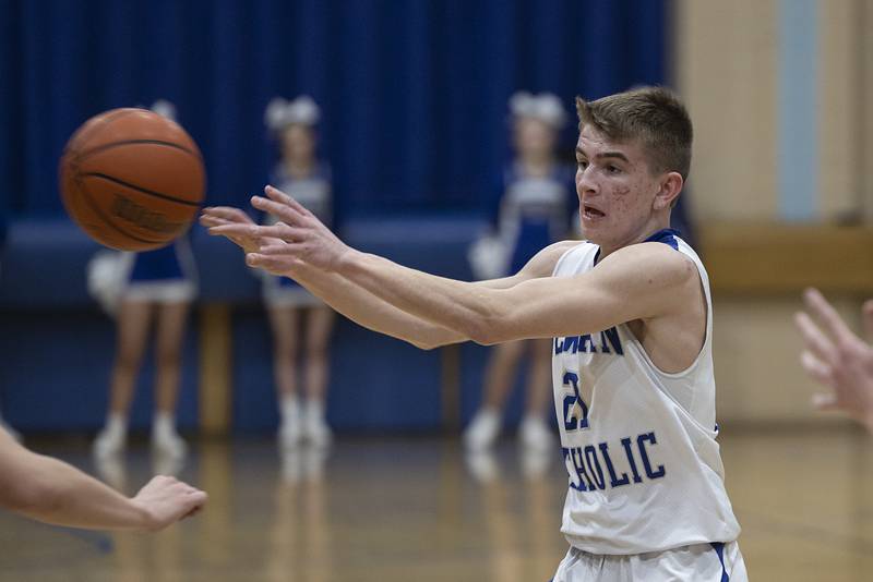 Newman’s Cody McBride makes a pass against AFC Monday, Feb. 19, 2024 in a regional quarterfinal game at Newman High School.