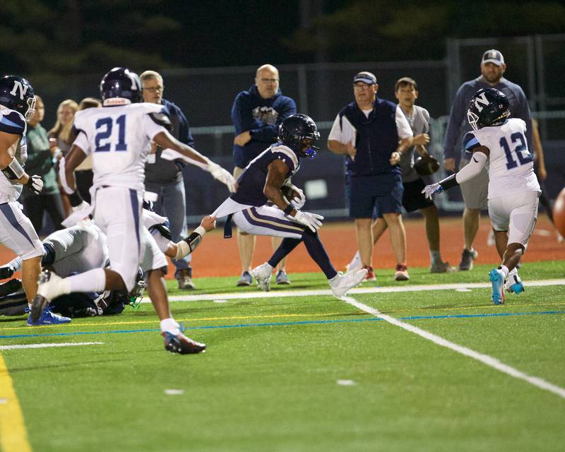 IC Catholi's KJ Parker  can not be stopped by Nazareth defense for a touchdown on Friday, Sept.15,2023 in Elmhurst.