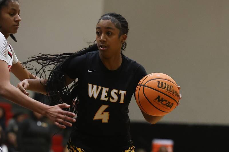 Joliet West’s Gabrielle Gavin looks for a play against Bolingbrook on Thursday, Jan 23, 2025 in Bolingbrook.