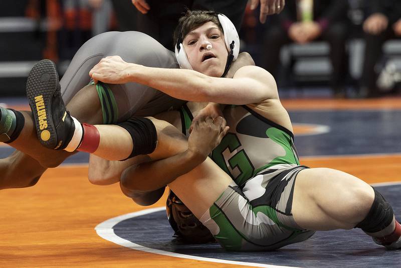 Grays Lake Central’s Vince DeMarco (right) and Ray Long of Niles Notre Dame compete in the 106 pound weight class of the 2A state individual wrestling finals Saturday, Feb. 22, 2025, at State Farm Center in Champaign.