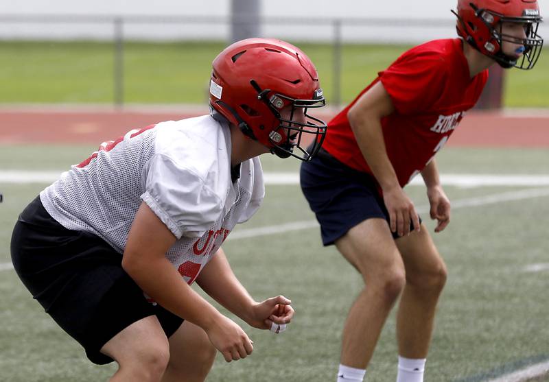 Huntley's Haiden Janke lines up at linebacker during the first day of football practice Monday, August 7, 2023, at the Huntley High School’s Red Raider Stadium.