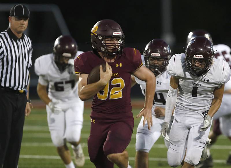 Richmond-Burton’s Steven Siegel runs for a touchdown during a Kishwaukee River/Interstate 8 Conference football game Friday, Sept. 9, 2022, between Richmond-Burton and Marengo at Richmond-Burton Community High School.