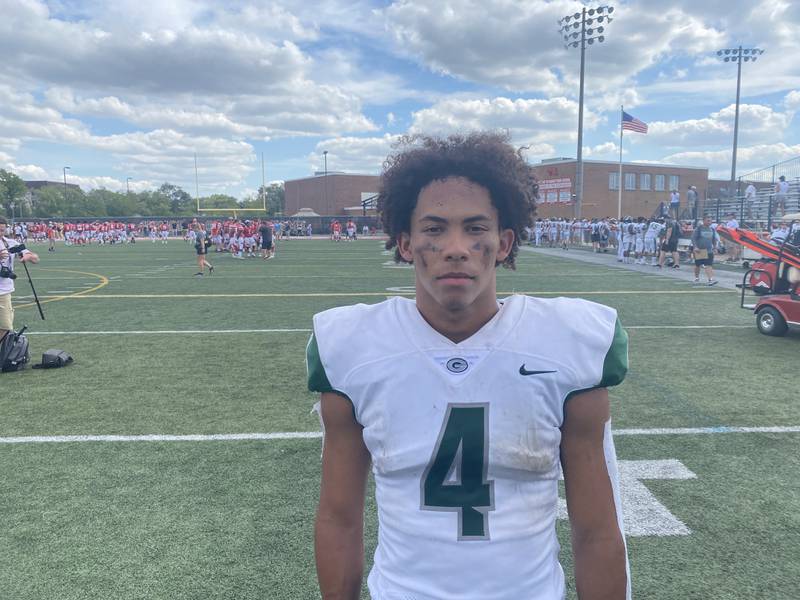 Glenbard West's Julius Ellens showed off his versatility and scored four touchdowns to help the Hitters beat Marist 33-31 on Saturday.