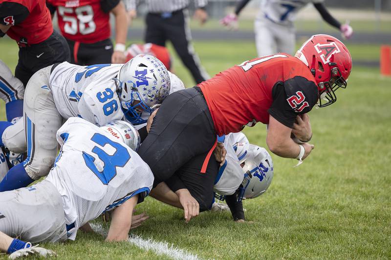 Amboy’s Quinn Leffelman punches it in for a TD against Martinsville Saturday, Nov. 9, 2024, in round two of the 8-man football playoffs.