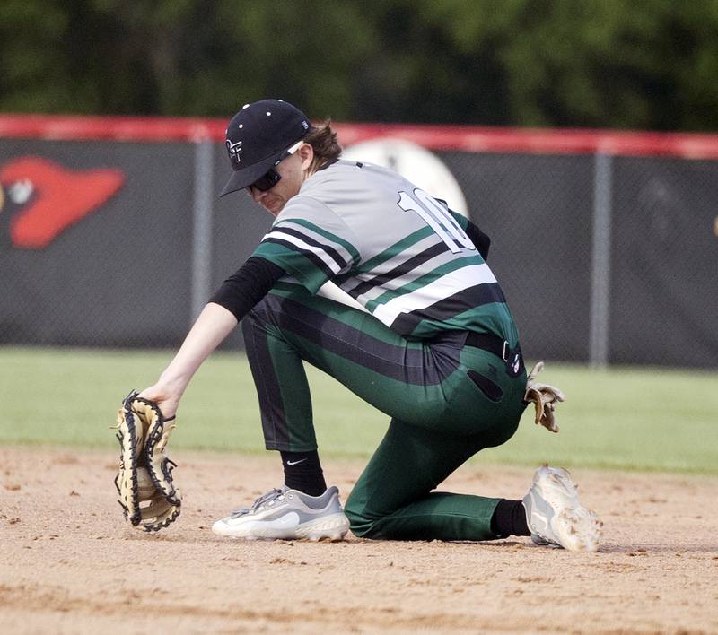 Rock Falls’ Owen Laws backhands a grounder at first base against Oregon in the Stillman Valley Class 2A Regional semifinal Thursday, May 22, 2025.