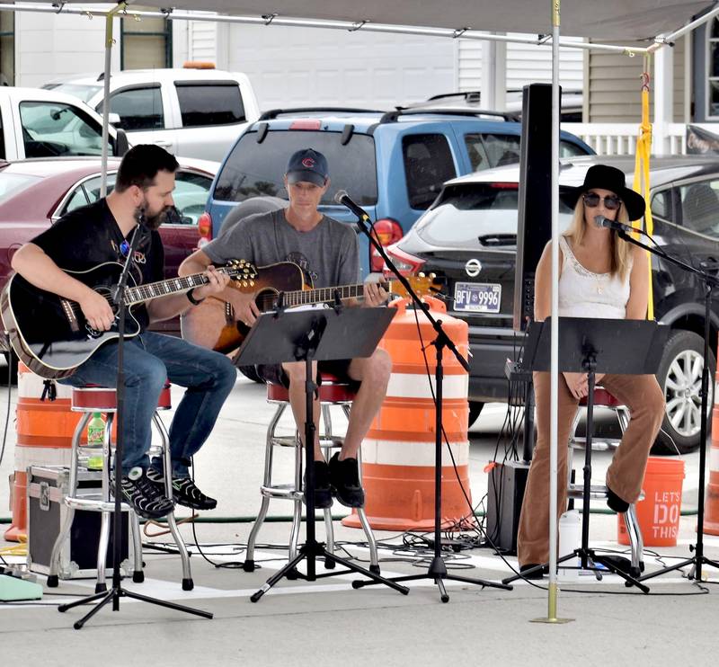 The Third Wheel performs Saturday during  Paint the Town in Morrison. Other musical acts during the street art festival were Back Water Bayou Band, Alex Fishbach, Don Engelkins, and the Wandering Mariachi Band.