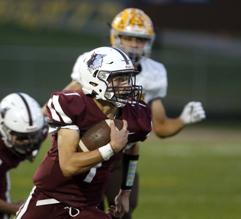 Prairie Ridge's Tyler Vasey returns the kickoff for a touchdown during a Fox Valley Conference football game between Jacobs and Prairie Ridge Friday, Sept. 16, 2022, at Jacobs High School in Algonquin.