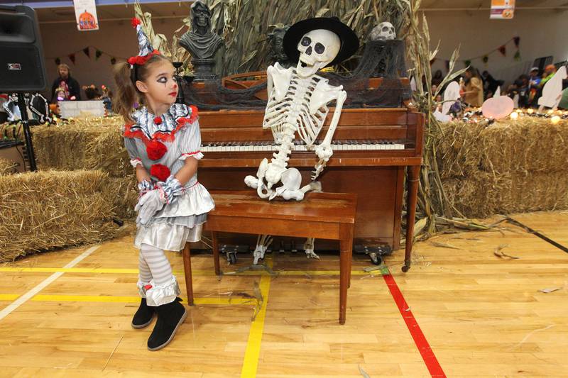 Sofia Reyna, 5, of Fox Lake looks at a skeleton on display during Witchy Thrills & Chills at the Lindenhurst Park District Lippert Community Center on October 14th in Lindenhurst.
Photo by Candace H. Johnson for Shaw Local News Network