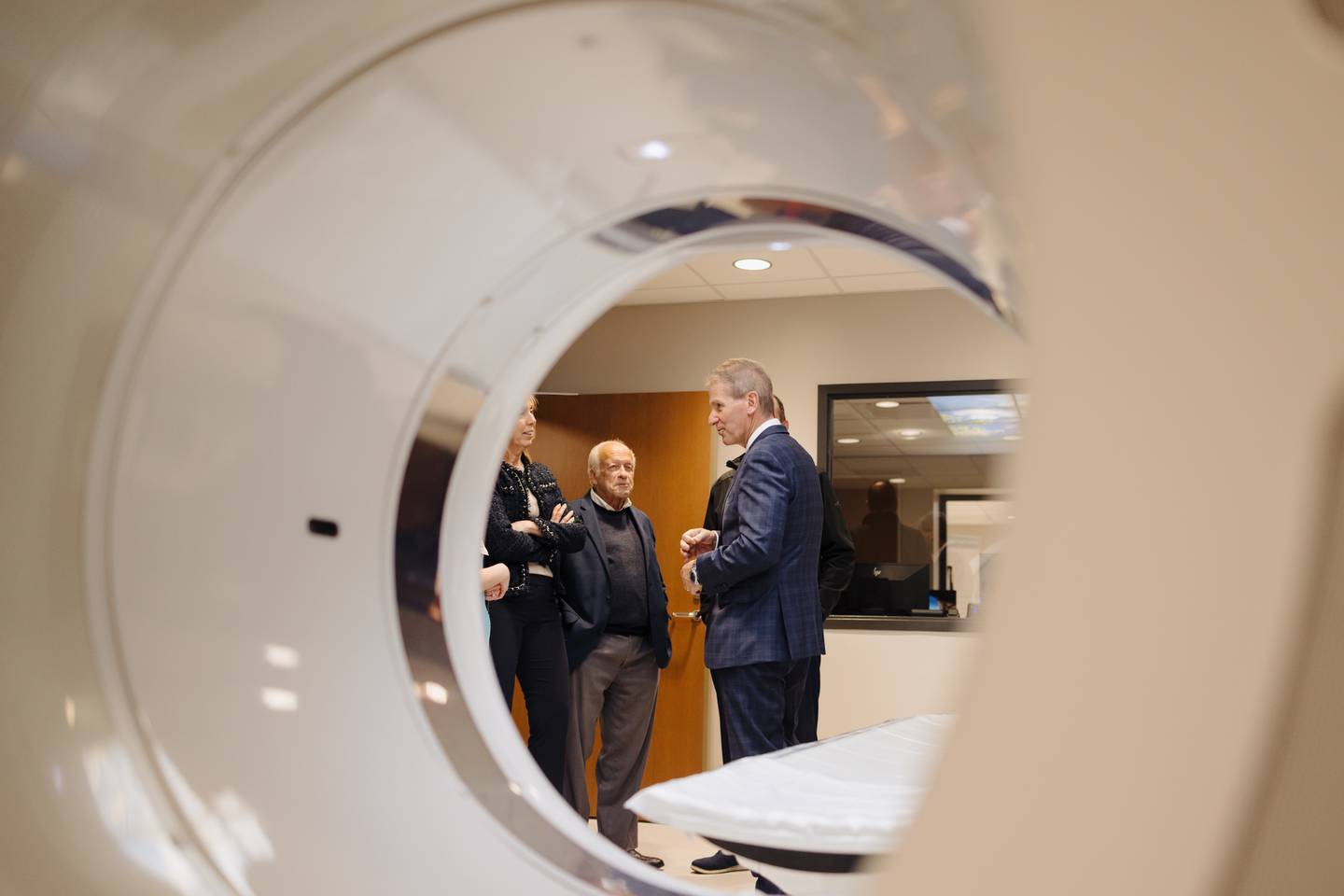 Riverside Healthcare President and CEO Phil Kambic speaks to board members and attendees of the open house introducing the installment of new imaging technology at the Bourbonnais campus.